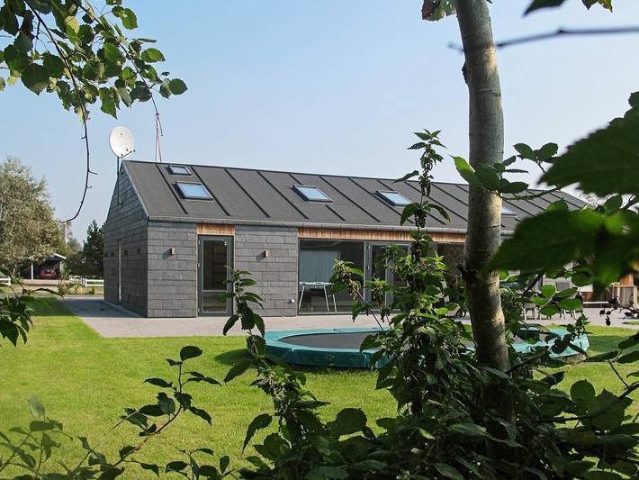 Ferienhaus für 9 Personen, mit Whirlpool und Terrasse sowie Garten und Sauna in Dannemare