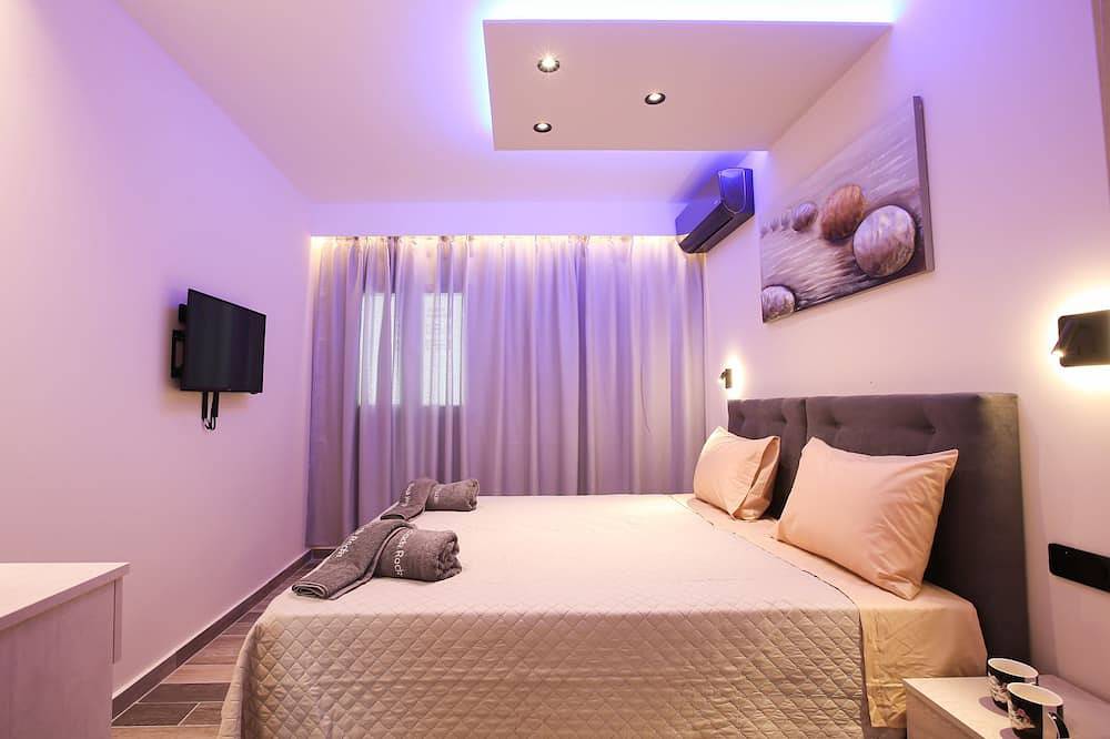 Black Rocks Family, Luxury Seafront Beach Maisonette in Agios Gordios, Korfu