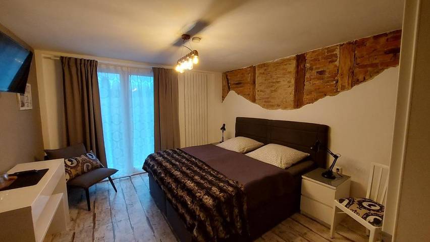 Ferienhaus für 14 Personen, mit Balkon und Terrasse sowie Garten und Ausblick in Buntenbock