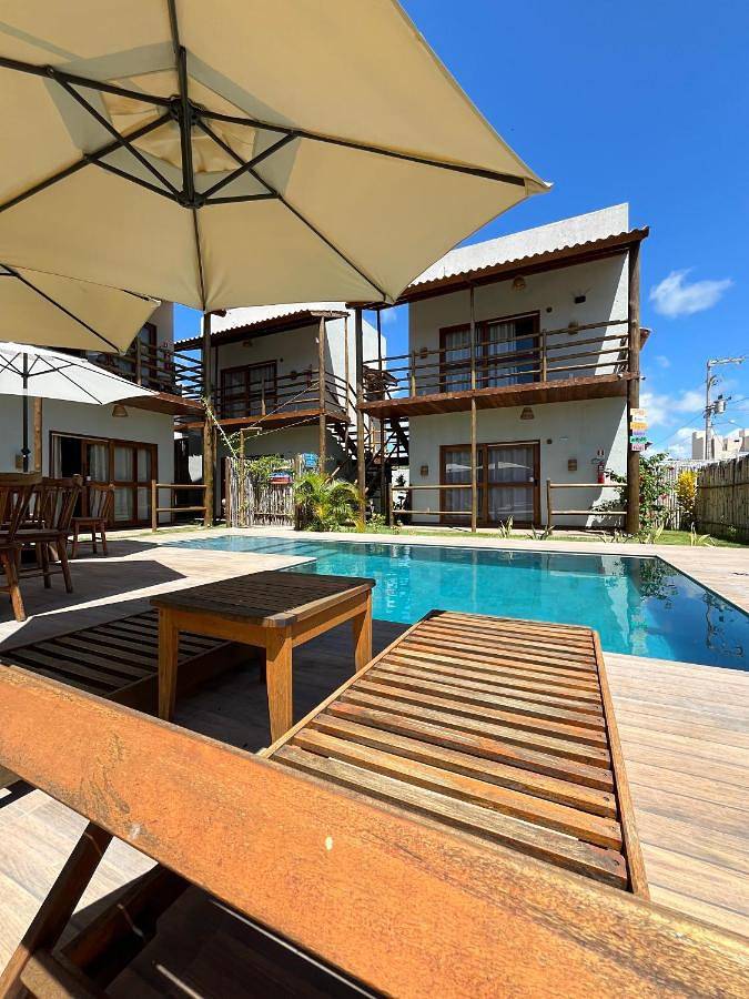 Casas e apartamentos de temporada para 4 pessoas, com jardim e piscina e ainda piscina infantil, com animais de estimação em Praia do Toque