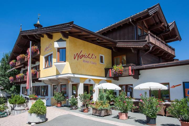 Appartement voor 7 personen, met tuin en sauna, kindvriendelijk in St. Johann in Tirol