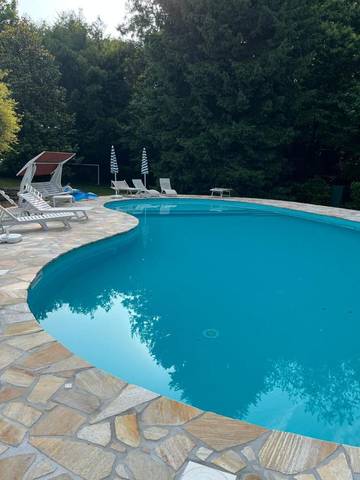 Gîte pour 6 personnes, avec piscine et vue ainsi que vue sur le lac et jardin à Porto Valtravaglia