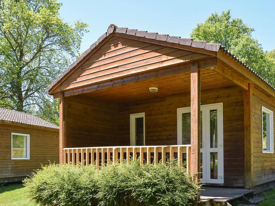 Camping Au Bois de Calais - Chalet 4 personnes - Chalet Arbre : 2 chambres, 4 pers in Région de Tulle