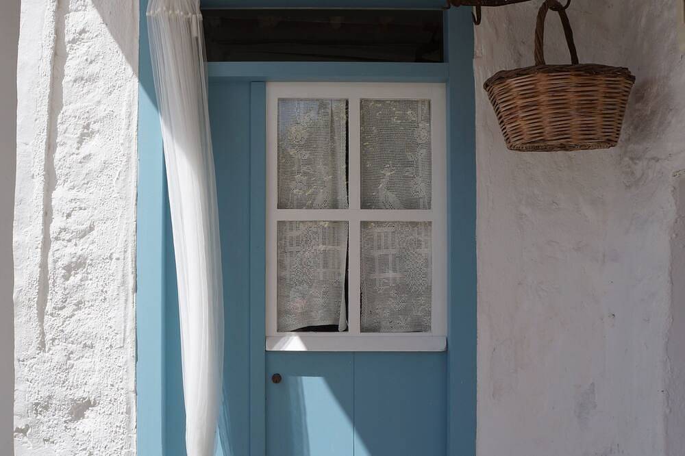 Cycladic stone house, part of the Kimolos Castle in Kimolos Stadt, Milos