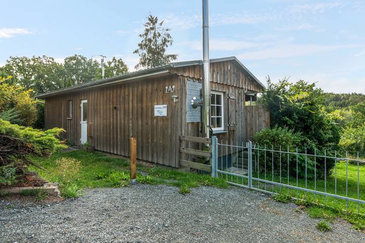 Ferienhaus für 4 Personen, mit Garten und Sauna sowie Seeblick in Saaleland