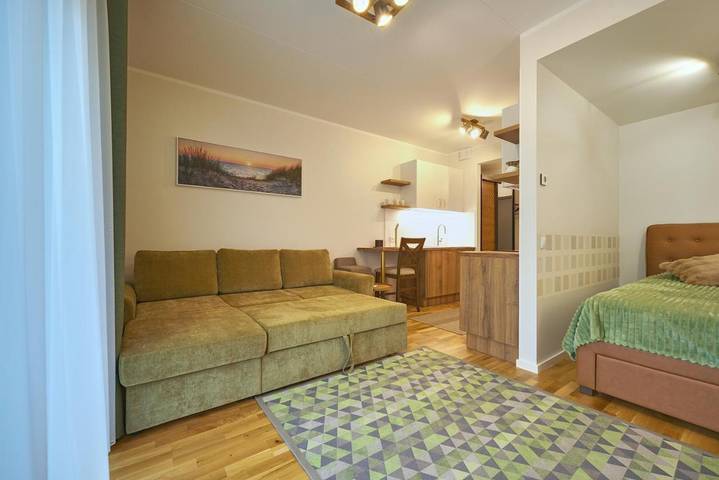 Appartement de vacances pour 3 personnes, avec Terrasse ainsi que Jardin et Vue