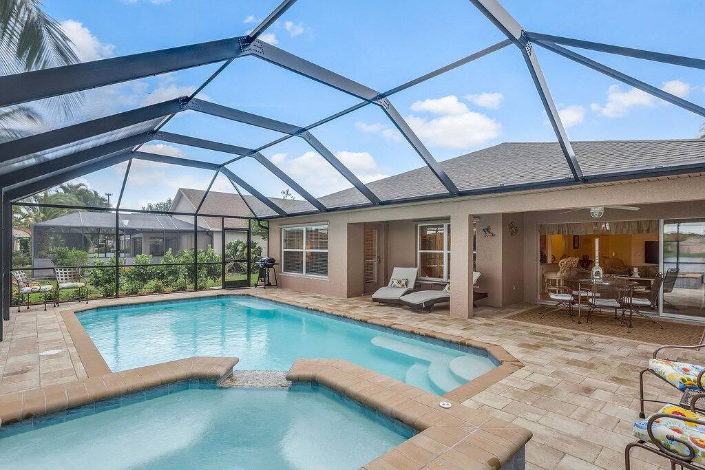 Schönes Haus am See mit privatem Pool, Whirlpool und möblierte Veranda in Iona, Southwest Florida
