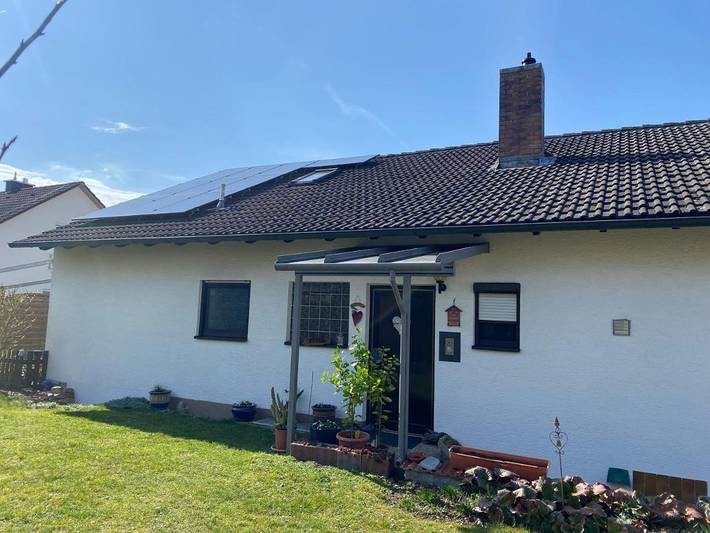 Ferienwohnung für 3 Personen, mit Terrasse und Garten sowie Ausblick in Münnerstadt