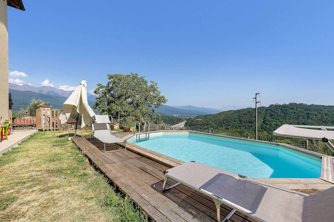 Maison de vacances « Stanza Comodità Piano Terra » avec vue montagne, piscine et jardin partagés in Pontremoli, Val di Magra
