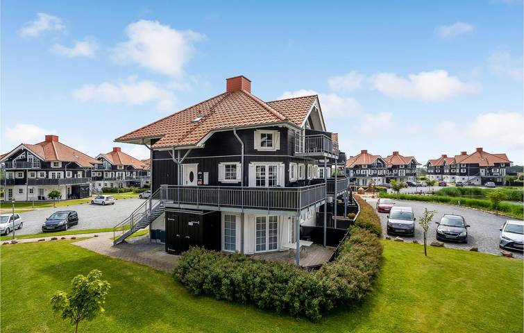 Ferielejlighed for 6 personer, med Terrasse og Jacuzzi såvel som Have og Sauna i Bogense