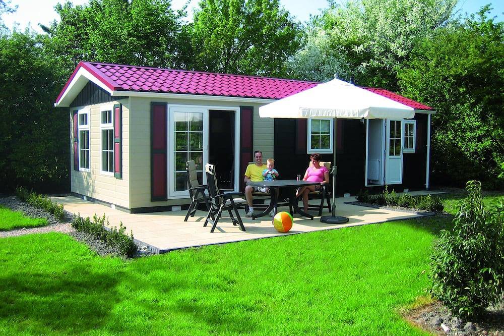 Gemütliches Chalet mitten im Grünen in der Nähe des Banjaardstrandes in De Banjaard, Kamperland