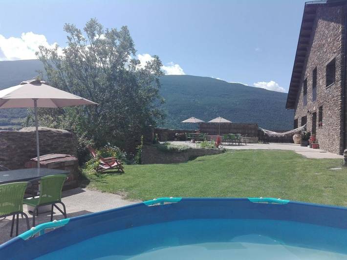 Location de vacances pour 4 personnes, avec Terrasse et Jardin ainsi que Piscine et Vue à Rialp - 4