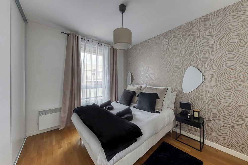 Apartamento entero, Apartamento para 4 personas - parking - estación de metro + tren - ascensor in Asnières-sur-Seine, Altos del Sena