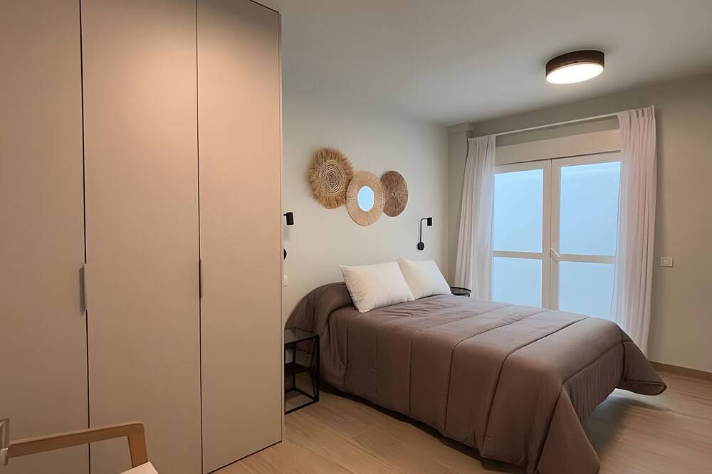Apartamento entero, Apartamento 'Dúplex B-03' con piscina comunitaria, Wi-Fi y aire acondicionado in Alfàs del Pi, Costa Blanca