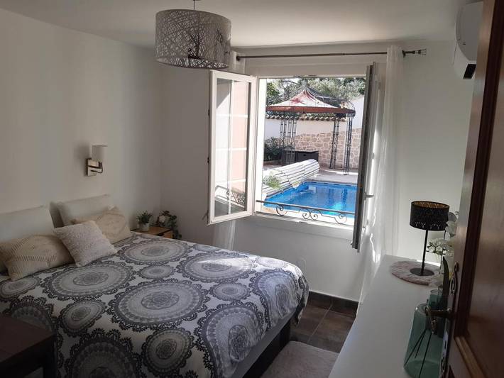 Appartement de vacances pour 2 personnes, avec jardin ainsi que vue et piscine