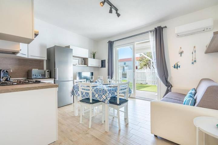 Apartamento para 4 personas, con jardín, Familias con niños en Isola Rossa
