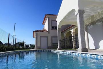 Casa rural para 8 personas, con terraza y jardín en Costa da Caparica