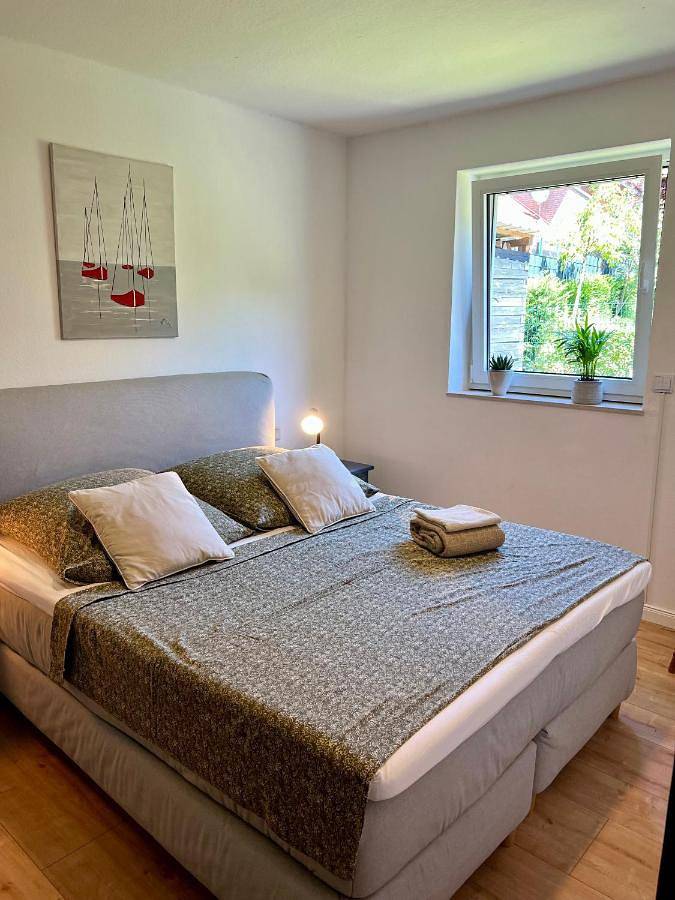 Ferienwohnung für 4 Personen, mit Balkon und Terrasse sowie Garten und Ausblick in Osnabrück
