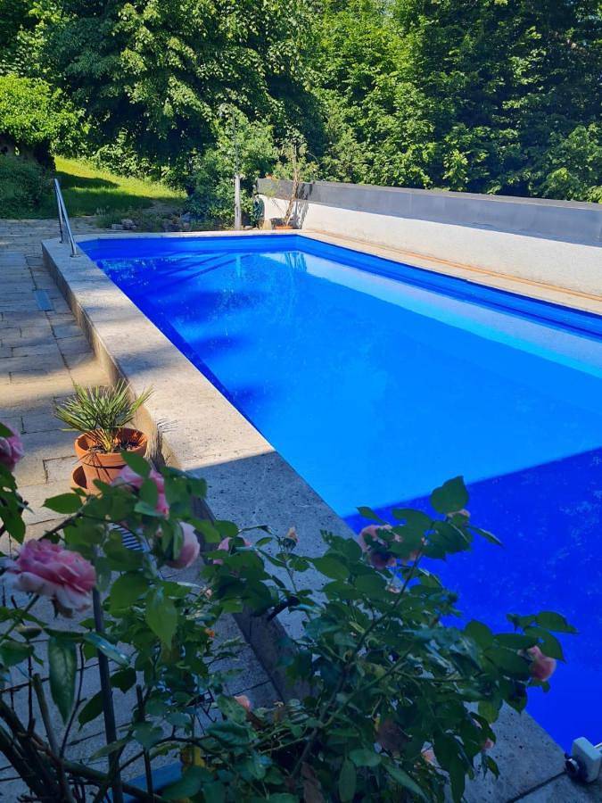 Gästehaus, mit Balkon und Terrasse sowie Garten und Pool