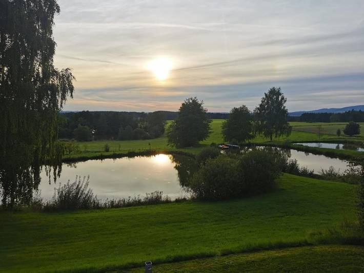 Ferienwohnung für 4 Personen, mit Terrasse und Garten sowie Seeblick und Ausblick