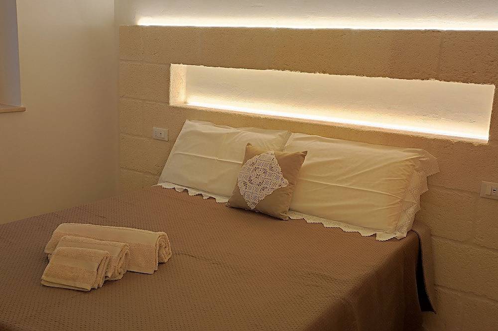Antichi Saperi: Olio e Peperoncino - Suite con piscina a Cisternino in Cisternino, Salento