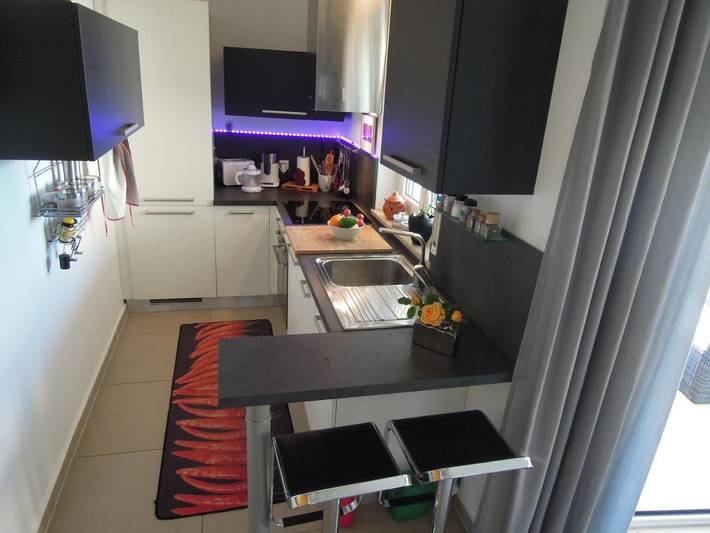 Ferienwohnung für 3 Personen, mit Balkon und Terrasse sowie Garten und Seeblick in Katoro