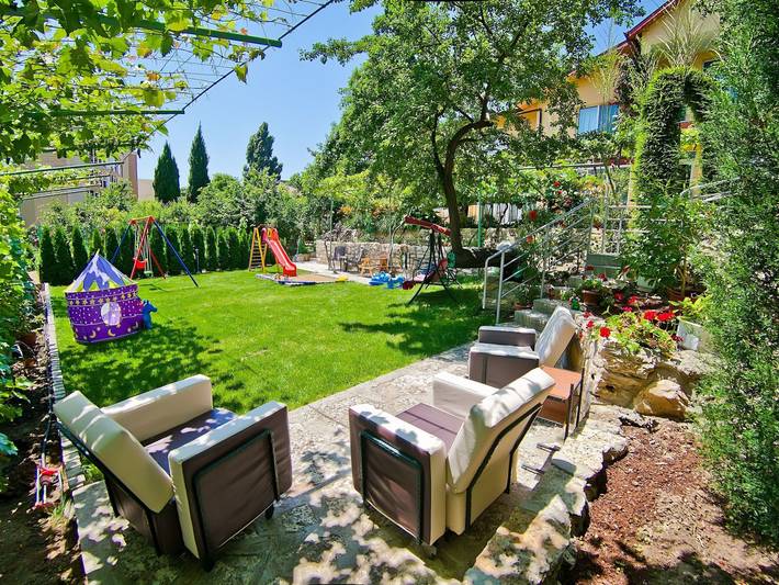 Ferienhaus für 5 Personen, mit Balkon und Terrasse sowie Garten