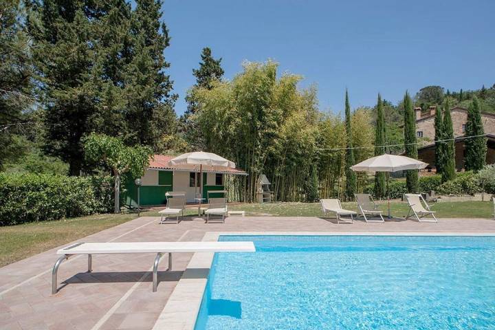 Ferienhaus für 7 Personen, mit Terrasse und Garten sowie Pool und Ausblick