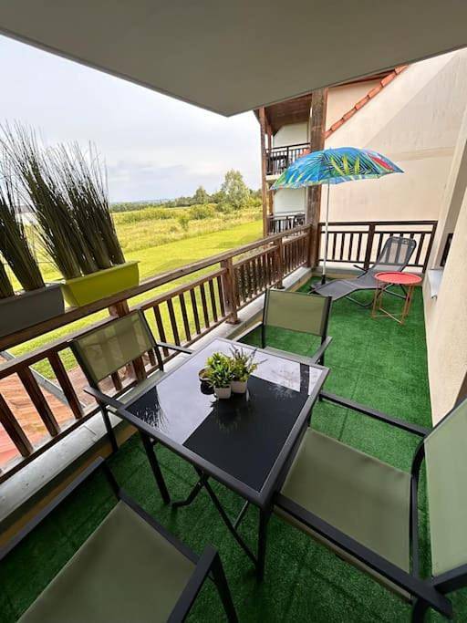 Appartement de vacances pour 4 personnes, avec Terrasse et Jardin ainsi que Piscine et Sauna