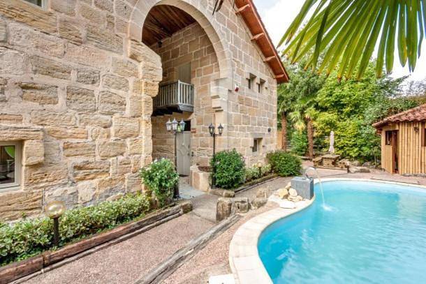 Maison de vacances pour 2 personnes, avec jardin ainsi que jacuzzi et piscine