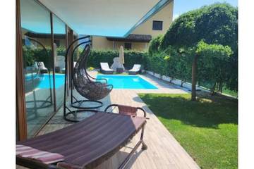 Villa für 4 Personen, mit Balkon und Garten in Trentino-Südtirol