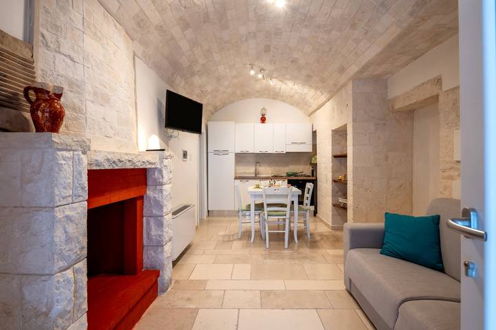 Appartamento intero, Appartamento 'Trullo Il Focolare In Masseria' con piscina condivisa, Wi-Fi e aria condizionata in Cisternino, Salento