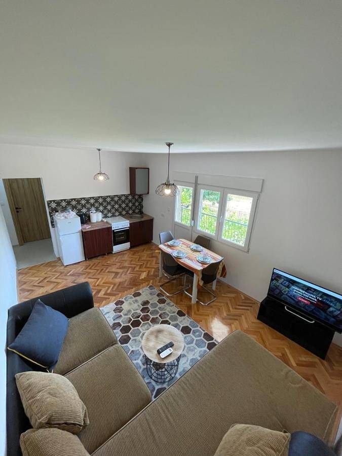 Appartement de vacances pour 3 personnes, avec balcon ainsi que vue et jardin