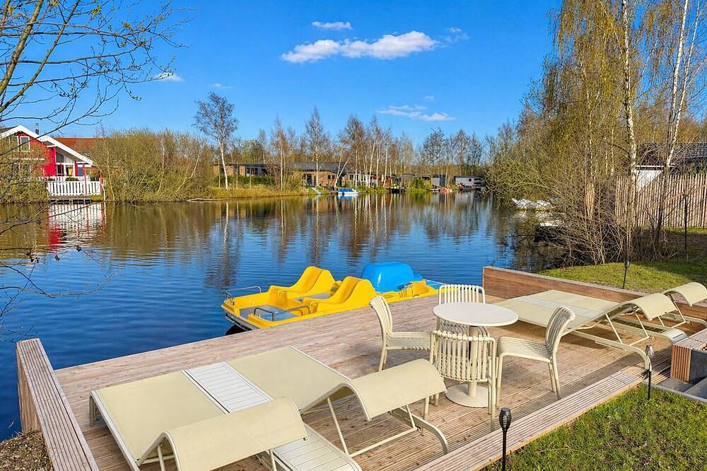 Franks Ferienhaus am See I privater Steg l Tretboot I Spieletage I Sauna l Natur in Twist, Emsland