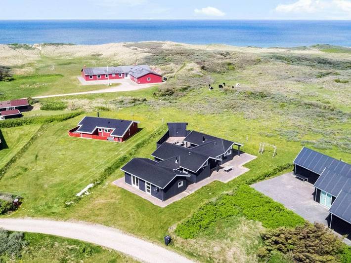 Ferienhaus für 8 Personen, mit Terrasse und Balkon/Terrasse sowie Sauna, mit Haustier in Løkken