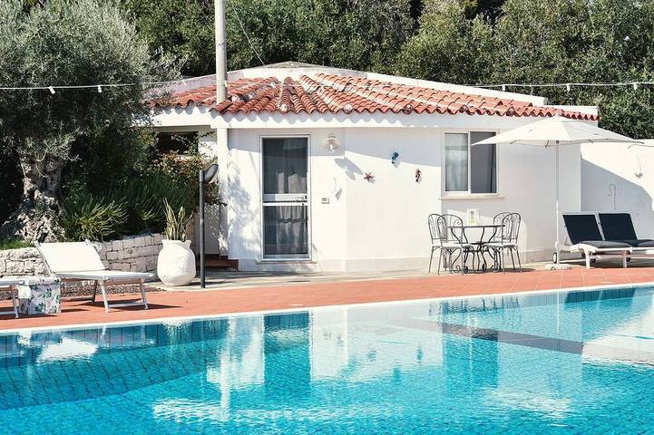Appartamento per 3 persone, con giardino e piscina in Capitolo