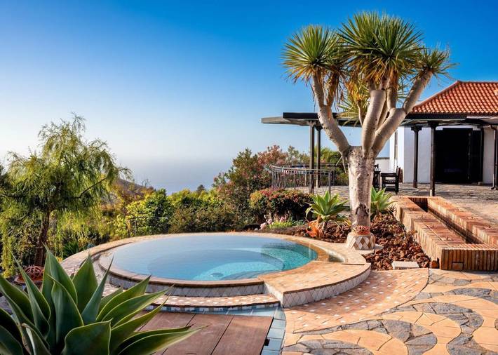 Chalet para 4 personas, con jardín y vistas al lago además de vistas y piscina, Se admiten mascotas en La Palma - 2