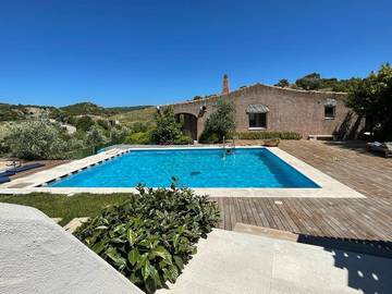 Cottage pour 2 personnes, avec terrasse et piscine ainsi que vue et jardin à Sant'Antonio di Gallura