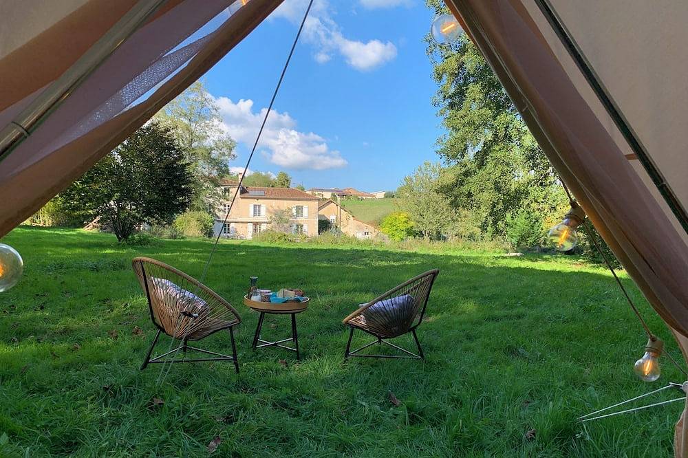 A Comfortable Nature Getaway at Moulin de Saza: Glamping Tent with a Pool in Le Vigeant, Vienne