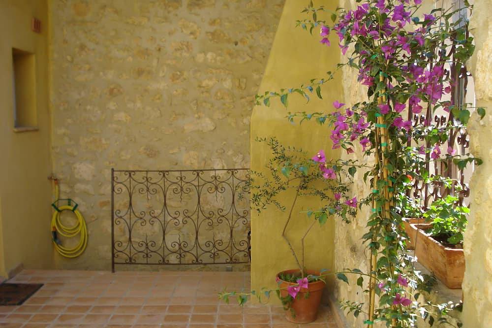 Village house near the Mediterranean open onto its patio terrace. in Roquefort-des-Corbières, Narbonne region
