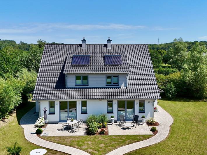 Ferienhaus für 4 Personen, mit Garten und Seeblick sowie Sauna und Terrasse am Greifswalder Bodden
