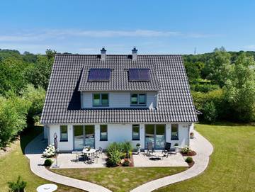 Ferienhaus für 4 Personen, mit Sauna und Garten sowie Seeblick und Terrasse in Mönchgut-Granitz