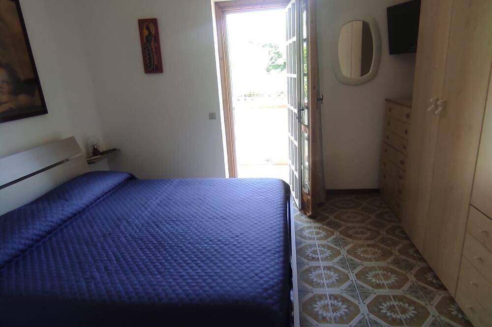 Casa vacanze a pochi passi dal mare, ideale per famiglie con giardino esterno in Leporano, Golfo di Taranto