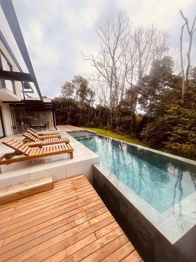 Casas e apartamentos de temporada para 12 pessoas, com jardim e piscina e ainda vista, com animais de estimação em Rancho Queimado