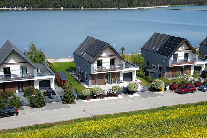 Domek przy plaży dla 10 osób, z widok i ogród oraz widok na jezioro w Polska