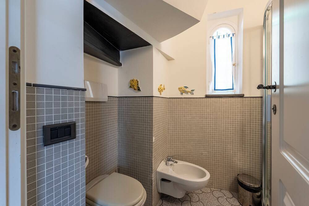 Paraggi Beach Dream by \"At Home\" in Puntapedale Beach, Santa Margherita Ligure
