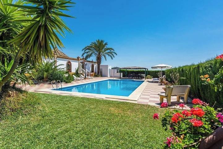 Location de vacances pour 12 personnes à Lora del Río