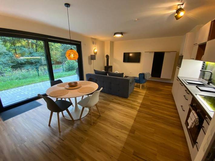 Ferienwohnung für 5 Personen, mit Terrasse und Garten sowie Sauna und Ausblick