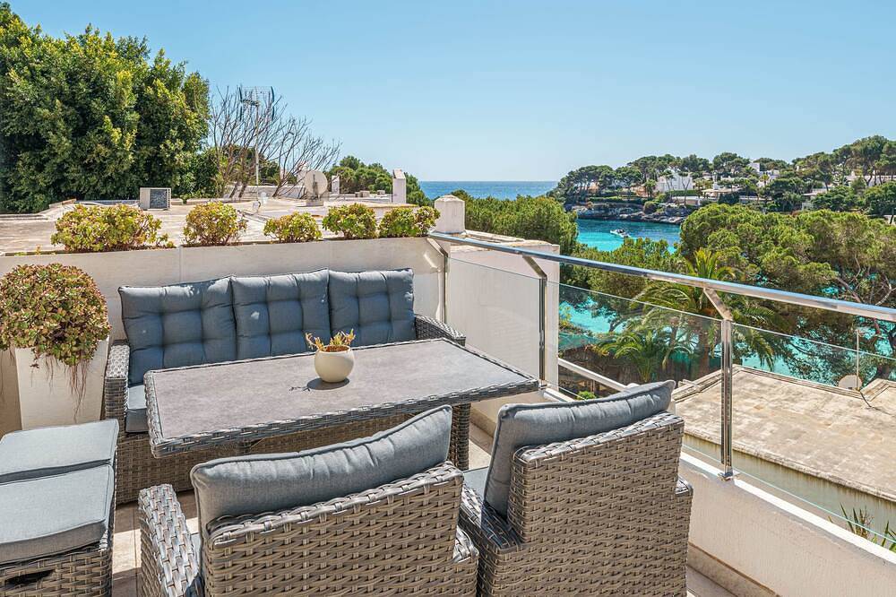 Ganze Wohnung, Apartment mit Blick auf den Strand von Cala Gran, Ac und Wifi in Cala d'Or, Santanyí