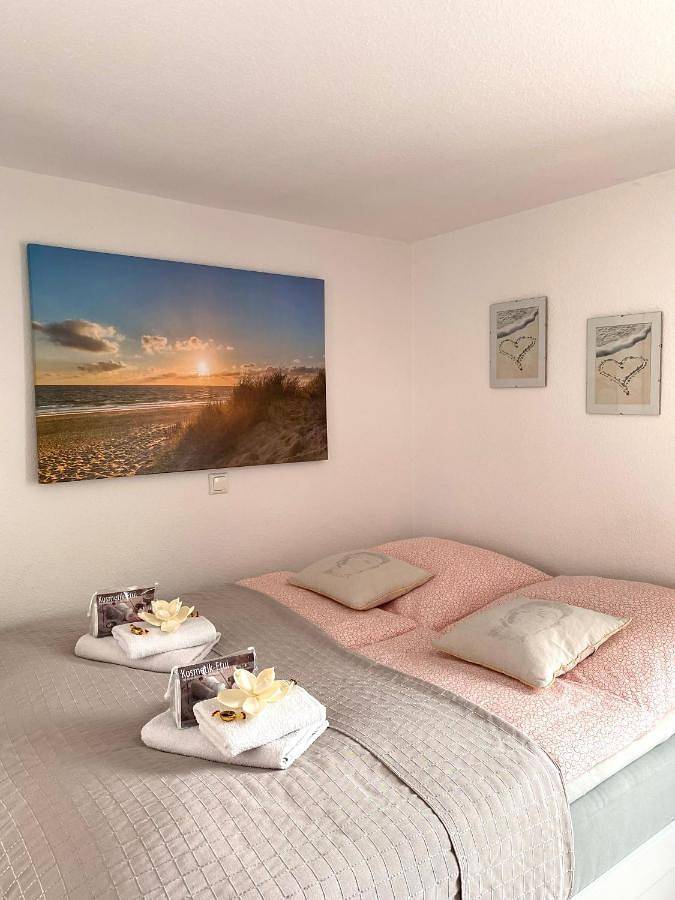 Ferienwohnung für 3 Personen, mit Balkon und Terrasse sowie Garten und Ausblick in Bergheim